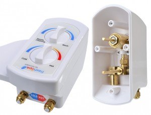 Inside look of the bidet attachment with metal connection and brass valves