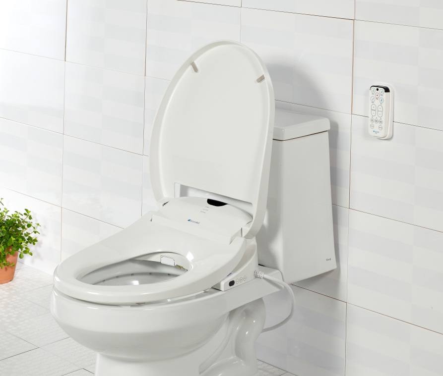 Bidet toilet seat installed on the toilet